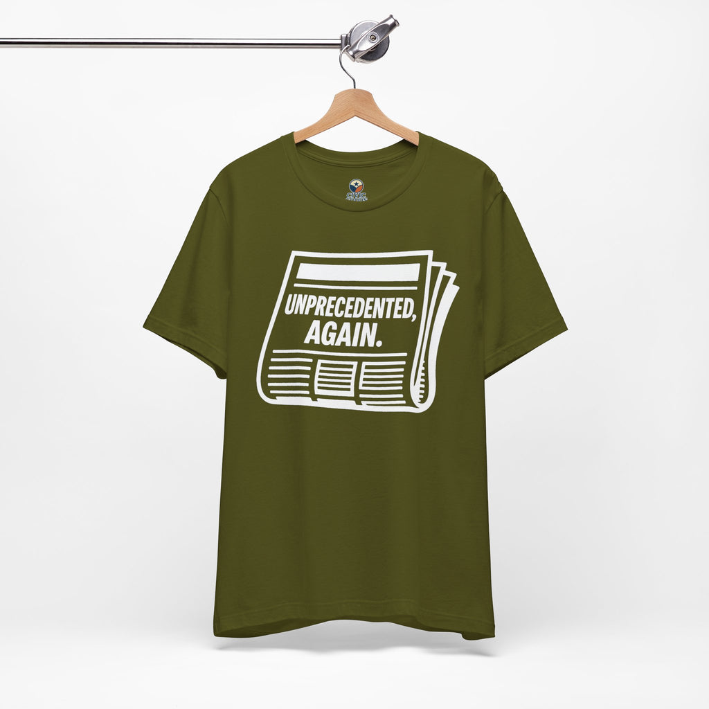 Unprecedented Again tee— Olive  - accent — angled hanging
