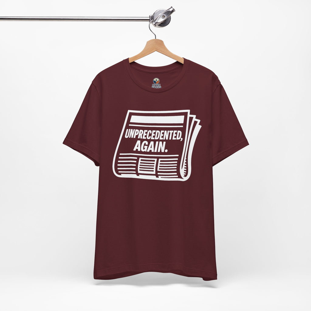 Unprecedented Again tee— Maroon  - accent — angled hanging
